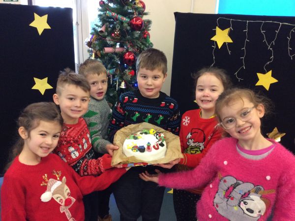 Acorn's class are proud of their Christmas cake!
